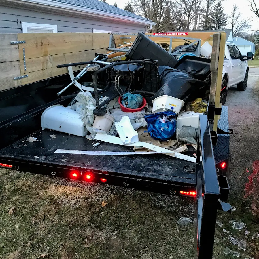 Roll-off dumpster delivered to a residential driveway in Marathon